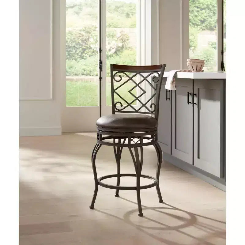Sgabello girevole da bancone in similpelle marrone, struttura in metallo bronzo, 1 posto