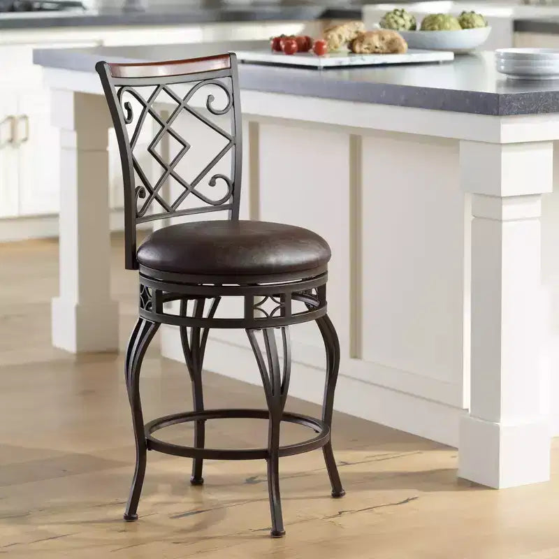 Sgabello girevole da bancone in similpelle marrone, struttura in metallo bronzo, 1 posto